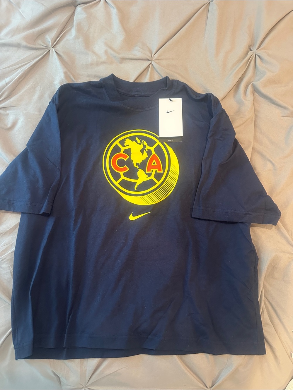 Nike Club América Women's Cotton Boxy Soccer T-Shirt in navy blue.